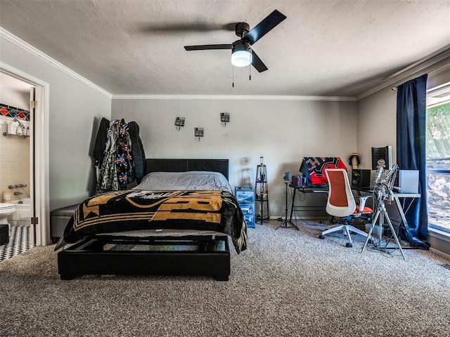 carpeted bedroom featuring ceiling fan, ornamental molding, and a textured ceiling