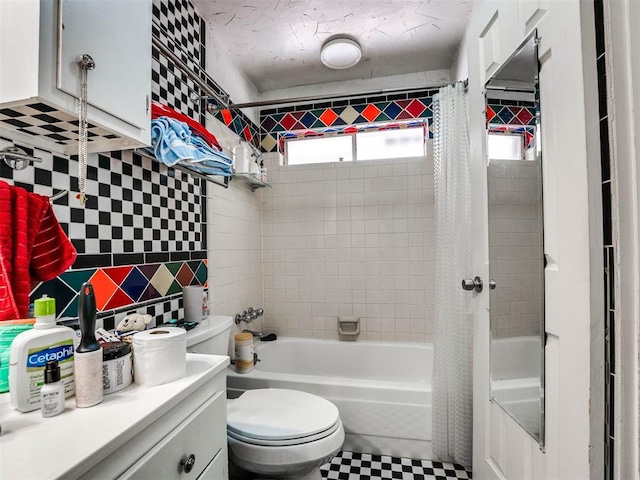 full bathroom featuring vanity, decorative backsplash, toilet, shower / bathtub combination with curtain, and tile walls