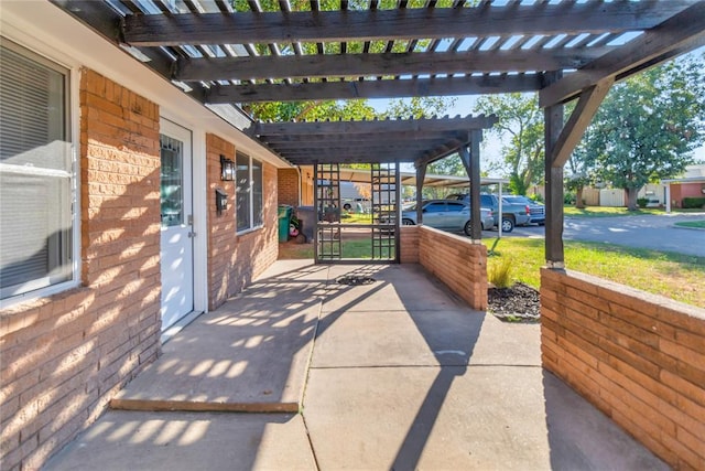 view of patio featuring a pergola