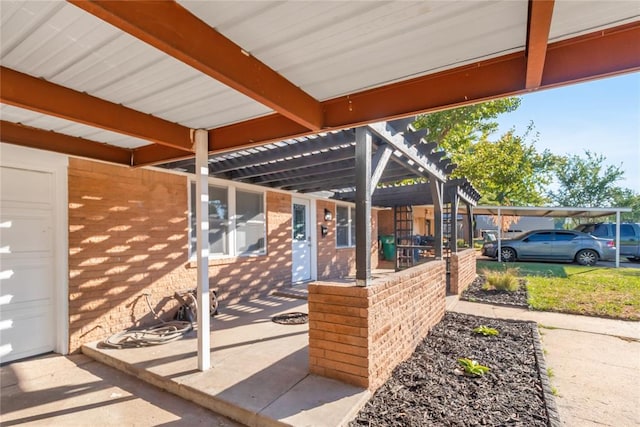 view of patio featuring a pergola