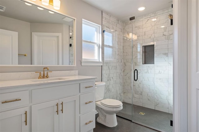 bathroom with tile patterned flooring, toilet, an enclosed shower, and vanity