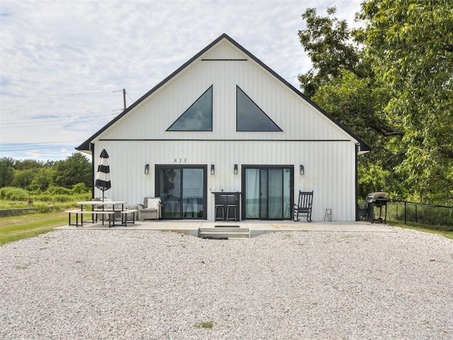 rear view of property with a patio