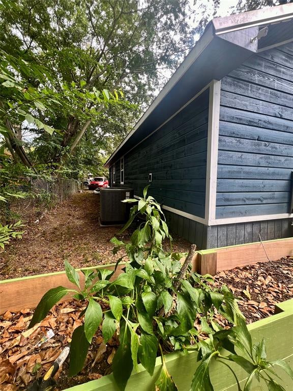 view of home's exterior featuring central AC unit