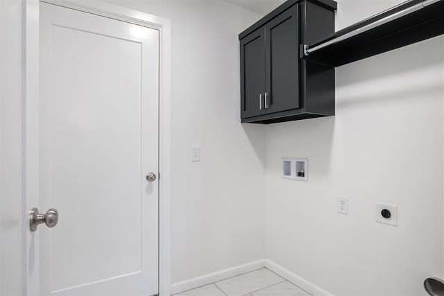 2144 Emily Rae Ln, Blanchard, OK 73010 - laundry room with electric dryer hookup, light marble finish flooring, hookup for a washing machine, and cabinet space