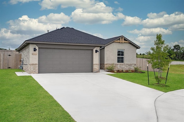 2144 Emily Rae Ln, Blanchard, OK 73010 - ranch-style house with brick siding, concrete driveway, an attached garage, and roof with shingles