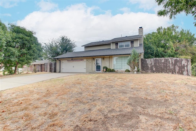 front of property featuring a garage