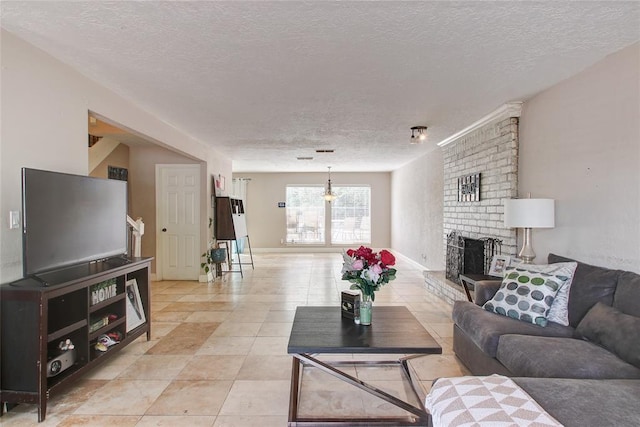 living room featuring a fireplace and a textured ceiling