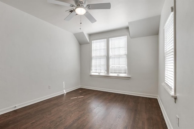 spare room featuring dark hardwood / wood-style floors and ceiling fan