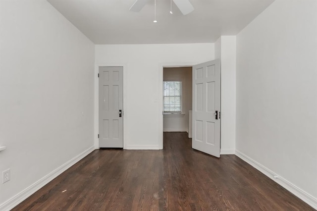 unfurnished bedroom featuring ceiling fan, a closet, and dark hardwood / wood-style floors