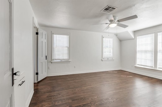 unfurnished room featuring ceiling fan and dark hardwood / wood-style floors