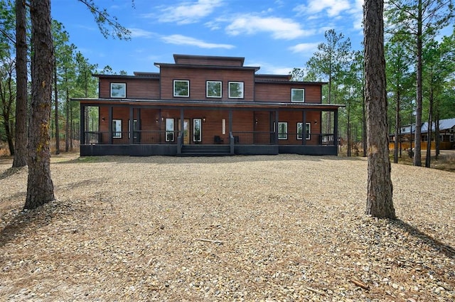 back of house with a porch