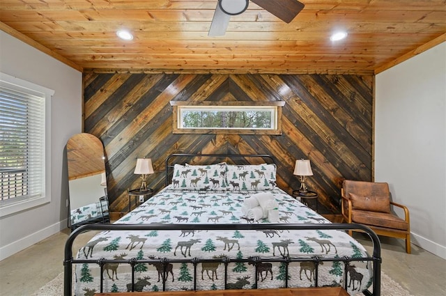 bedroom featuring wooden ceiling, ceiling fan, and wooden walls