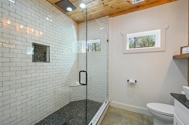 bathroom featuring a shower with door, vanity, a baseboard radiator, and toilet