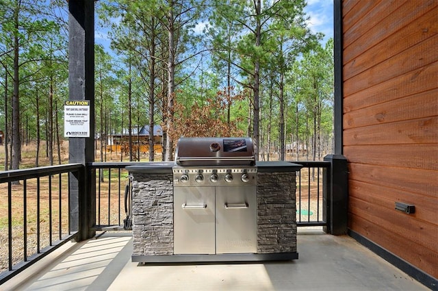 view of patio with a grill