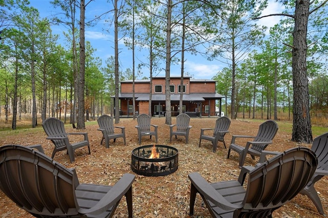 view of patio / terrace featuring a fire pit