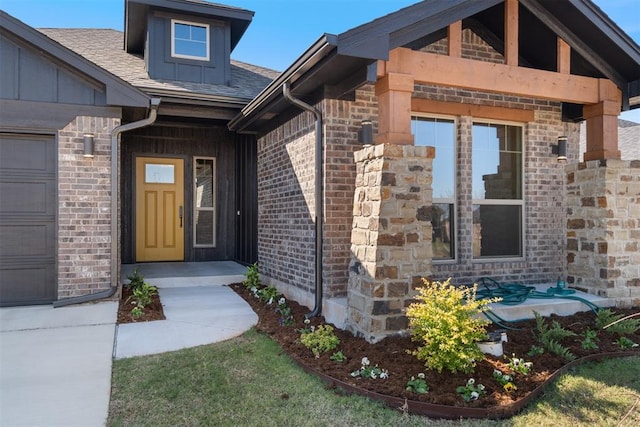 entrance to property featuring a garage