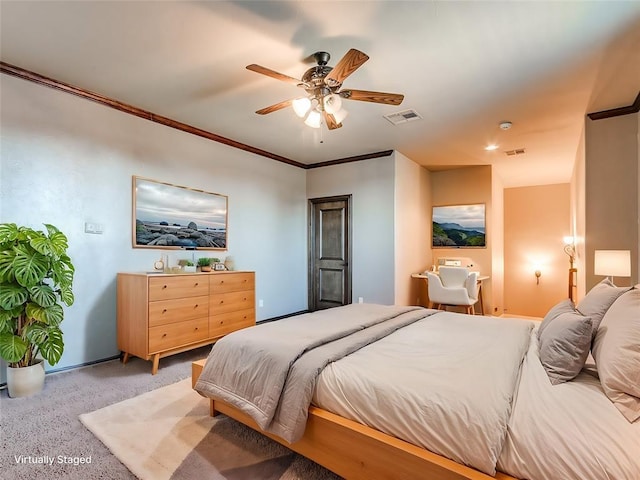 bedroom with visible vents, baseboards, ceiling fan, ornamental molding, and light carpet