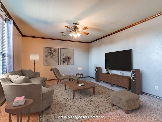 carpeted living room featuring visible vents, baseboards, a ceiling fan, and ornamental molding