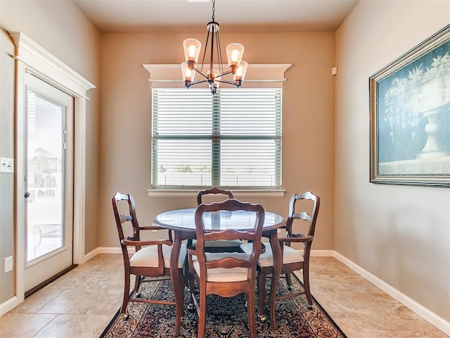 dining room featuring a chandelier