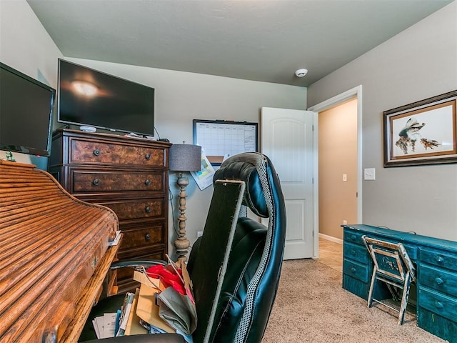 bedroom featuring light colored carpet