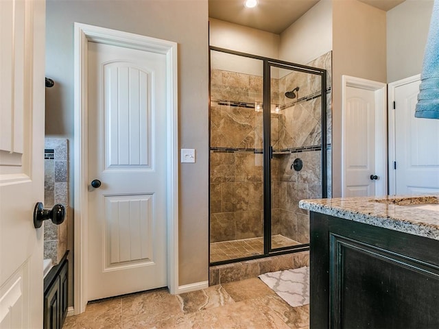 bathroom featuring vanity and walk in shower