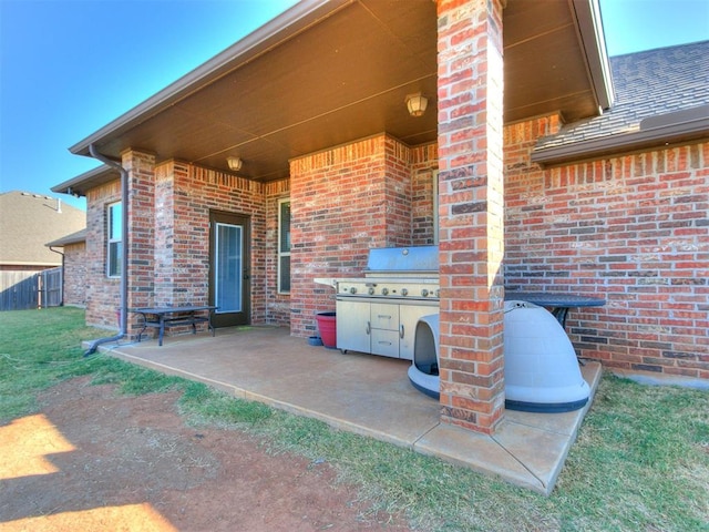 view of patio with a grill and area for grilling