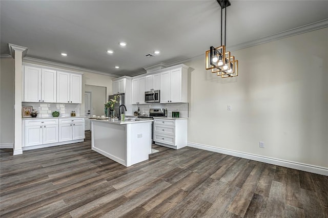 kitchen featuring white cabinetry, dark wood-type flooring, and stainless steel appliances