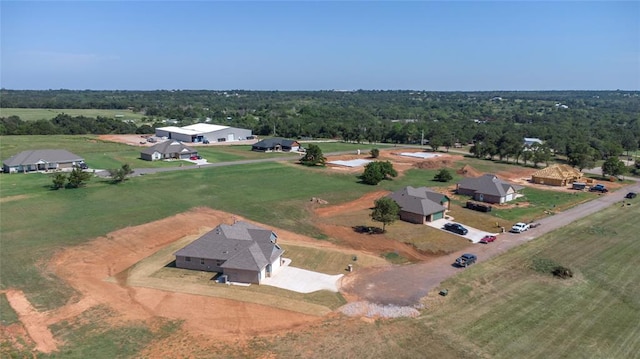 birds eye view of property featuring a rural view