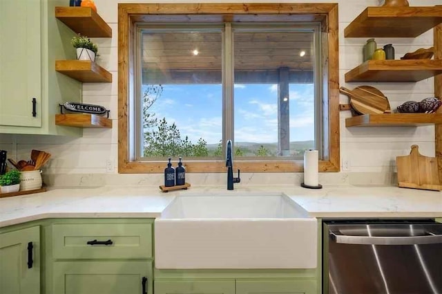 88 E Fork Cir, Broken Bow, OK 74728 - room details featuring open shelves, stainless steel dishwasher, a sink, and green cabinets