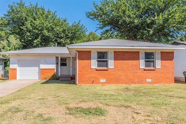 ranch-style home with a garage and a front lawn