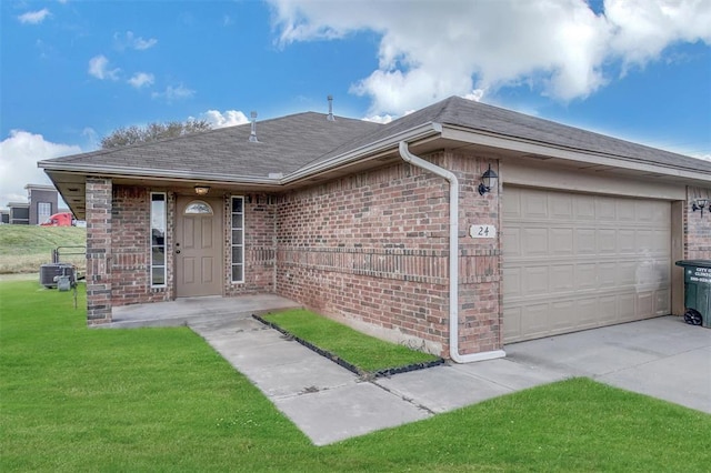 ranch-style house with a front lawn and a garage