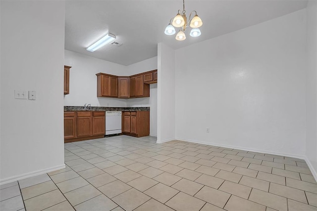 kitchen with sink, dishwasher, hanging light fixtures, a notable chandelier, and light tile patterned floors