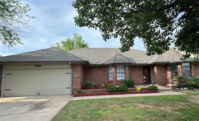 ranch-style house with a front lawn and a garage