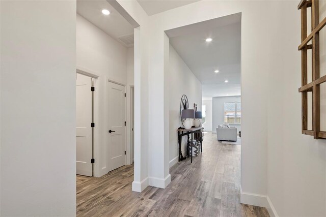 hallway featuring light hardwood / wood-style floors