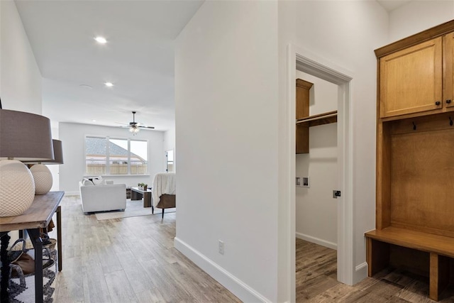 hallway featuring light hardwood / wood-style flooring