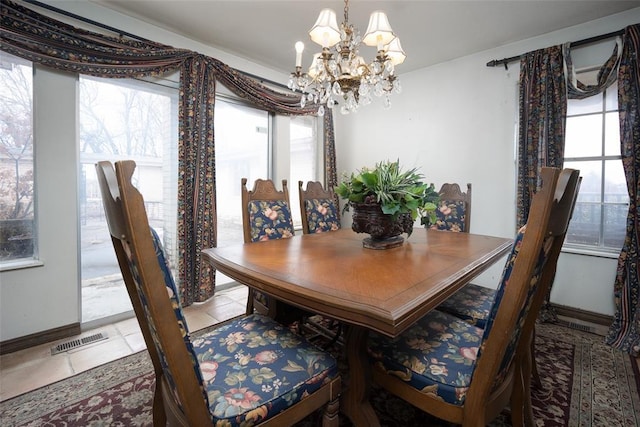 dining room featuring a notable chandelier