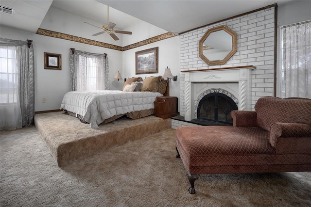 bedroom featuring lofted ceiling, ceiling fan, and carpet flooring