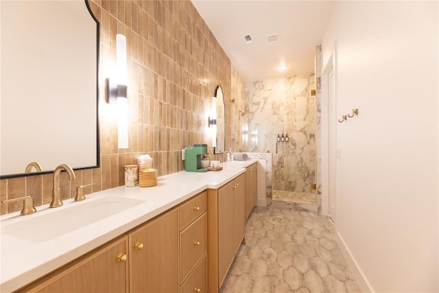 bathroom featuring vanity and walk in shower