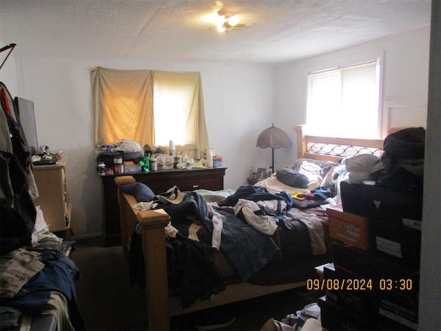 bedroom with a textured ceiling