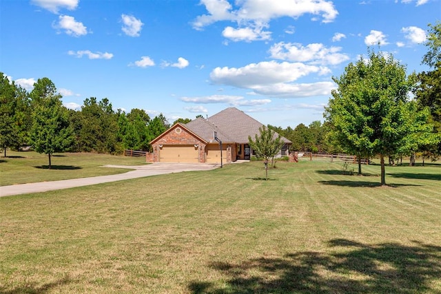 exterior space with a front lawn and a garage