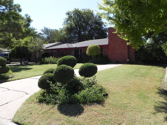 exterior space with a lawn