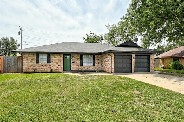 ranch-style house with a garage and a front lawn