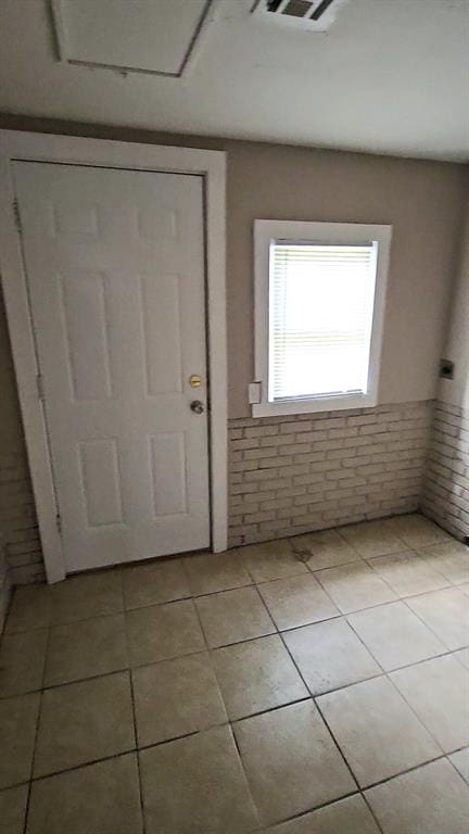 view of tiled entrance foyer