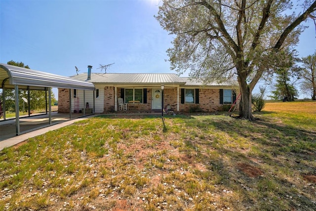 single story home with a front yard and a porch