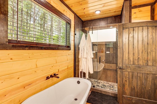 bathroom with separate shower and tub, wooden walls, and wood ceiling