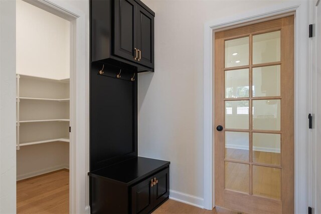 1103 Mount Irving Way, Norman, OK 73071 - mudroom with light wood-type flooring and baseboards