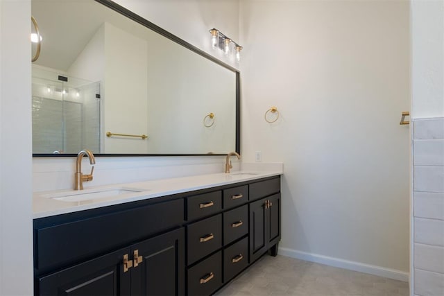 bathroom with tile patterned flooring, vanity, and an enclosed shower