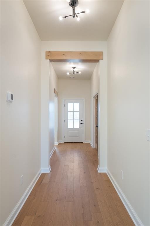 1103 Mount Irving Way, Norman, OK 73071 - corridor with hardwood / wood-style floors, baseboards, and a chandelier