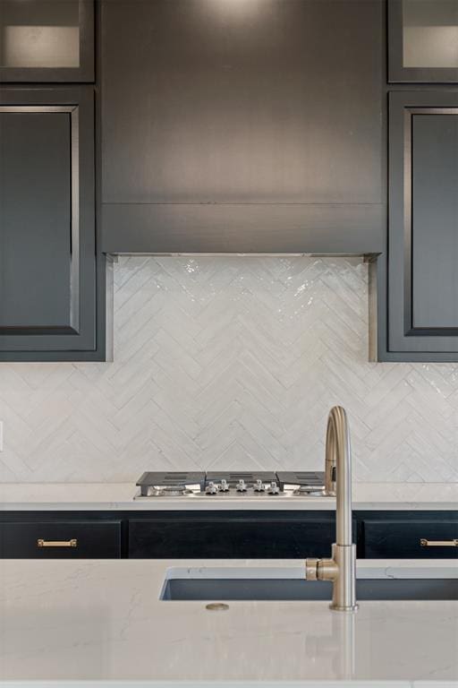 1103 Mount Irving Way, Norman, OK 73071 - kitchen with tasteful backsplash, light countertops, and a sink