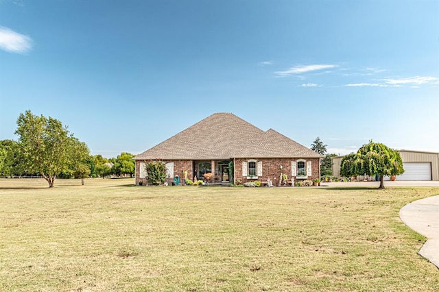 12600 SW 58th St, Mustang, OK 73064 - view of front facade featuring a front lawn